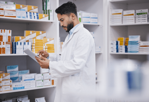 Pharmacist looking at medications